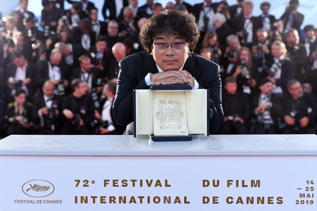 CANNES, FRANCE - MAY 25: Director Bong Joon-Ho, winner of the Palme d'Or award for his film "Parasite" poses at theÂ winner photocall during the 72nd annual Cannes Film Festival on May 25, 2019 in Cannes, France. (Photo by Pascal Le Segretain/Getty Images)
