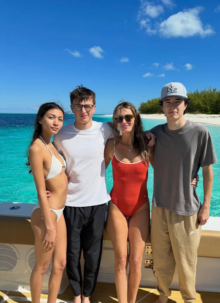 Photo shared by Mark Wahlberg's wife Rhea Durham featuring their sons Brendan and Michael, and the latter's girlfriend Sunni Gaines, while on vacation in the Bahamas, November 2025