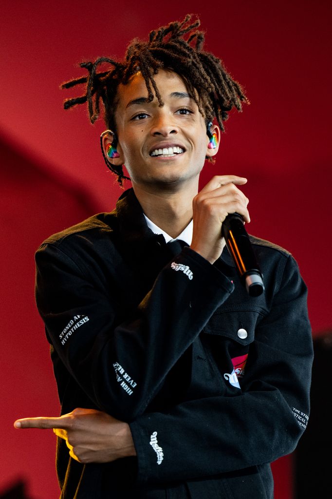 Jaden Smith performing and holding a microphone