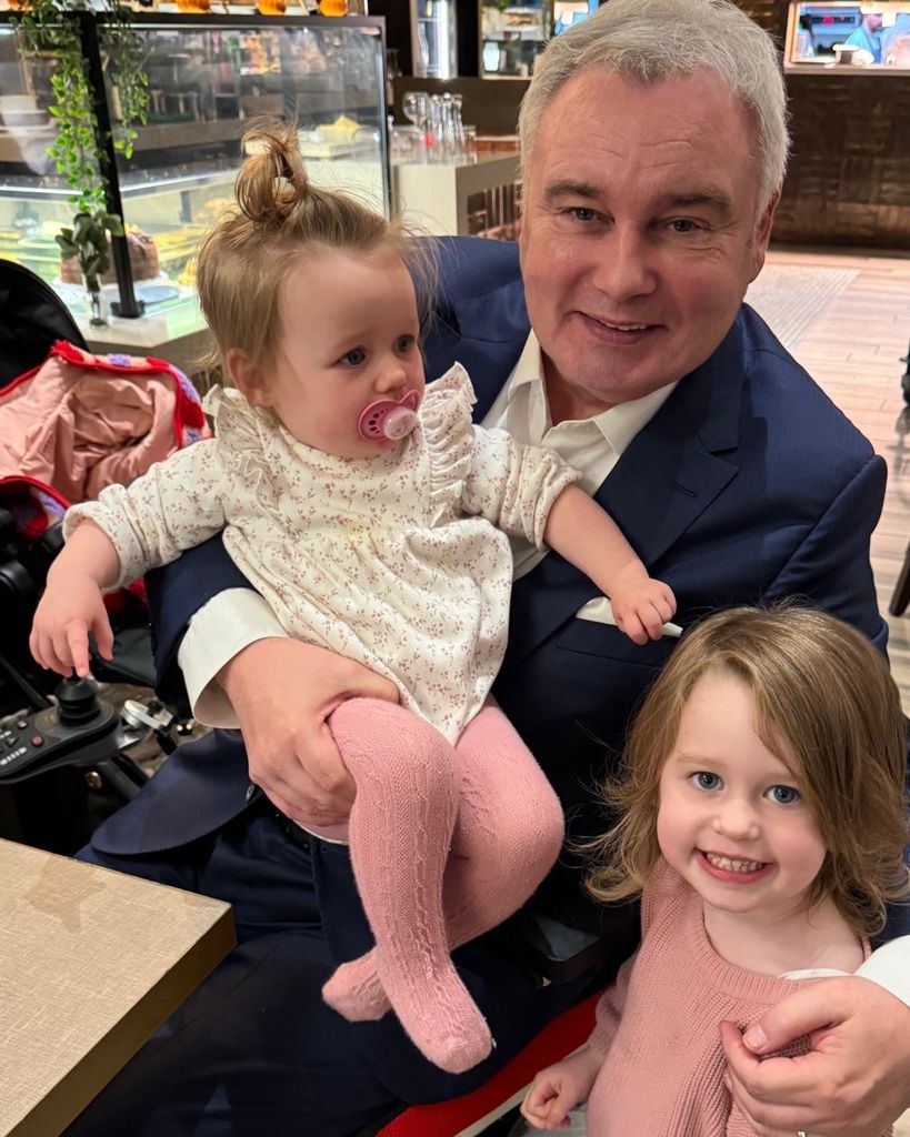 grandad with two granddaughters