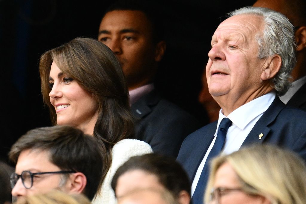 Britain's Catherine, Princess of Wales (L), and World Rugby Chairman Bill Beaumont smiling at the rugby World Cup