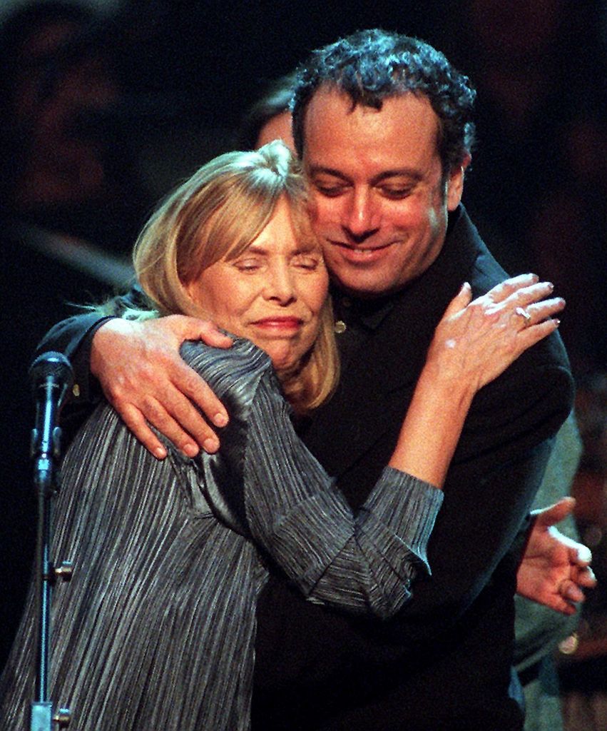 Joni Mitchell hugging ex-husband Larry Klein