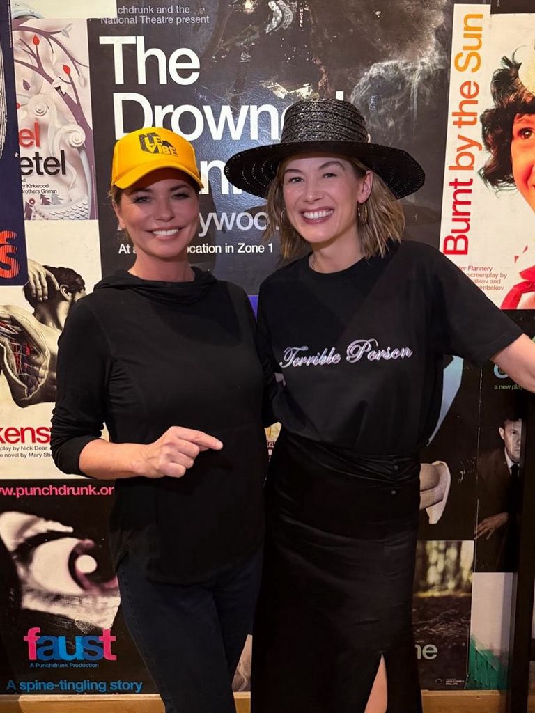 Shania Twain and Rosamund Pike pose for a photo backstage after "Inter Alia" at the National Theatre in London, shared on Instagram