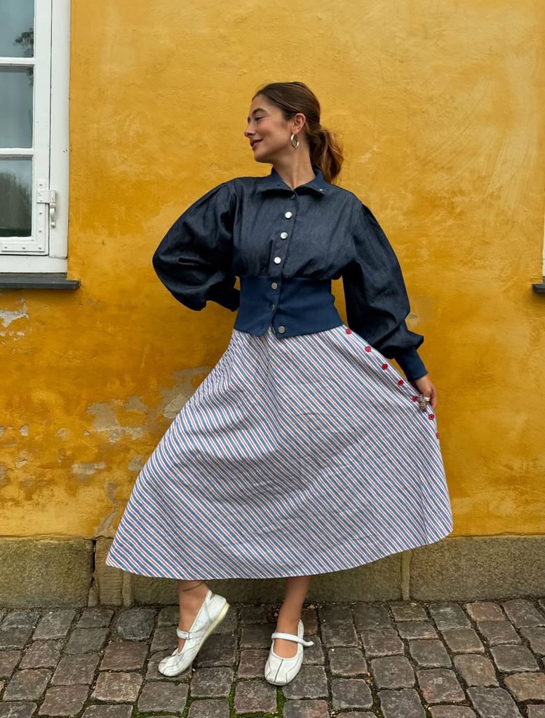 Izadora Hodges in skirt and denim jacket