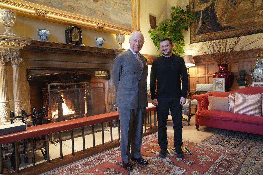 Britain's King Charles III and Ukraine's President Volodymyr Zelensky pose for a photo in the Saloon at Sandringham House