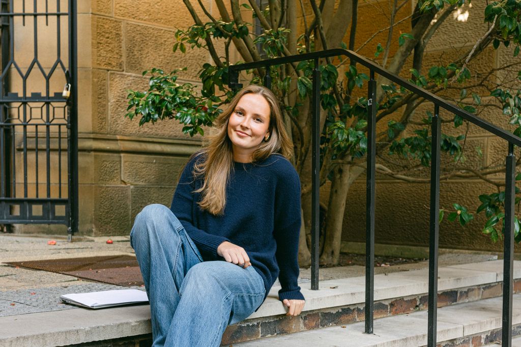 Princess Ingrid wearing jeans and jumper on campus