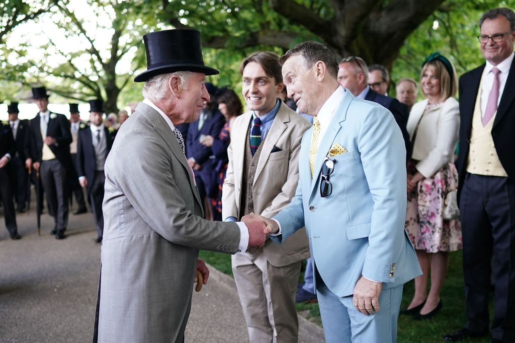 King Charles III meeting Barney and Bradley Walsh during the Sovereign's Creative Industries Garden Party at Buckingham Palace,