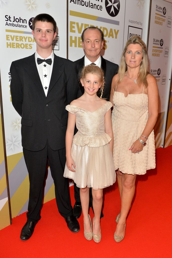 Quentin Willson with his wife and two of their children