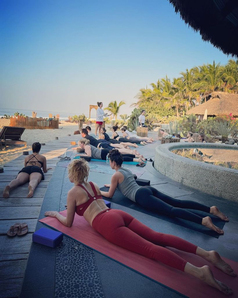 Heather Graham, 54, displays her yoga-honed physique in itsy bitsy