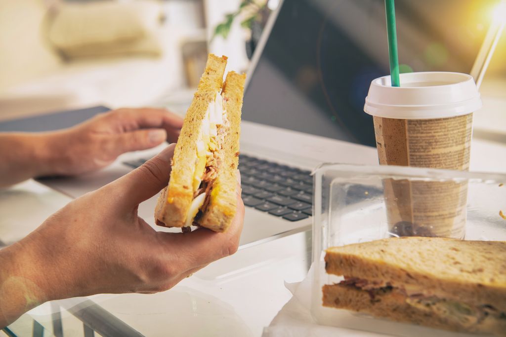Eating lunch at your desk can actually make you feel less productive and more tired in the afternoon