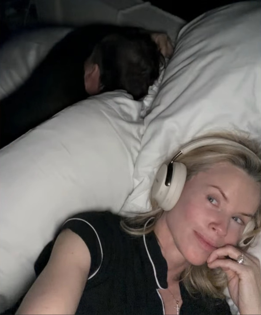Donnie Wahlberg sleeps beside Jenny McCarthy in a selfie taken by the latter, wearing headphones, shared on LIVE with Kelly and Mark