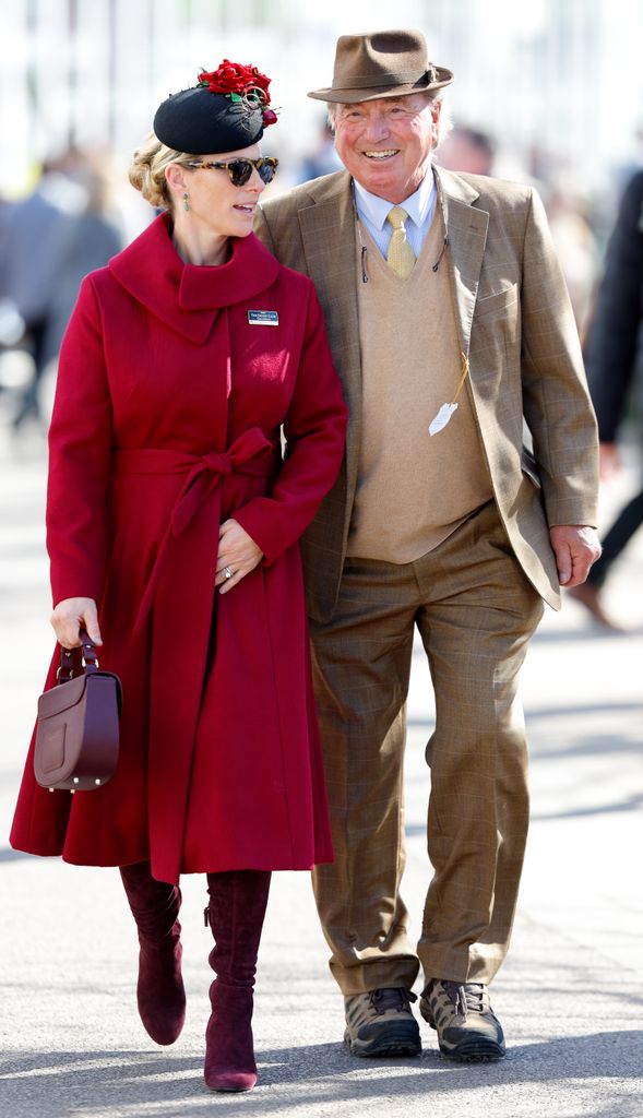 Zara Tindall and her father Mark Phillips attend day 4 'Gold Cup Day' of the Cheltenham Festival at Cheltenham Racecourse on March 18, 2022 in Cheltenham, England. 