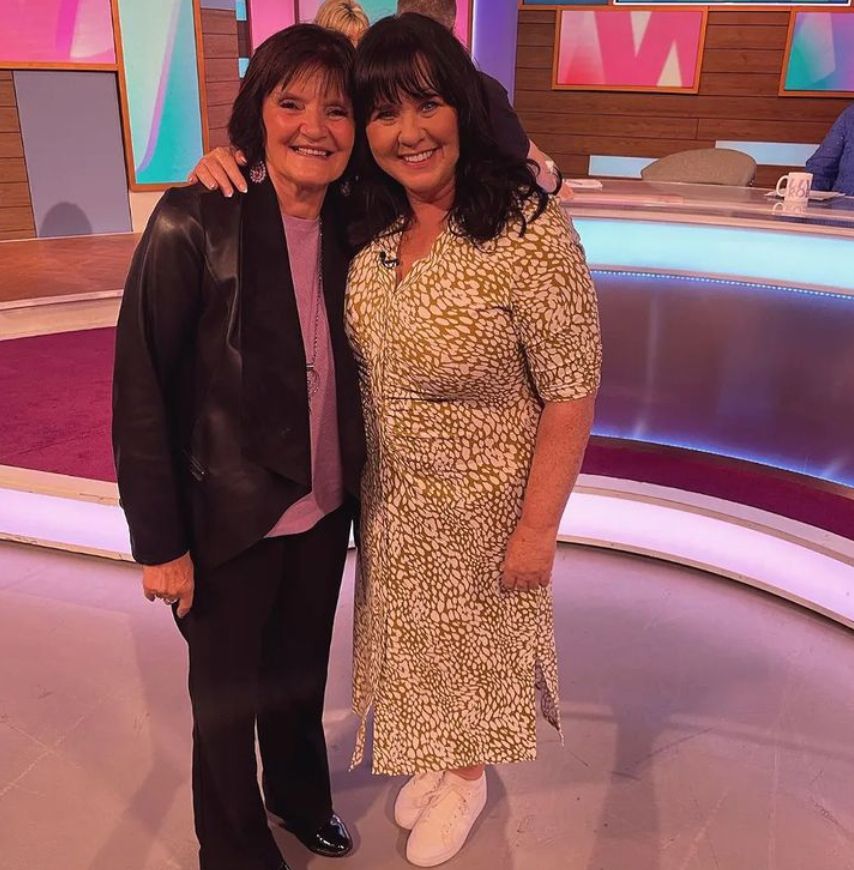 Anne Nolan and Coleen Nolan with arms round each other