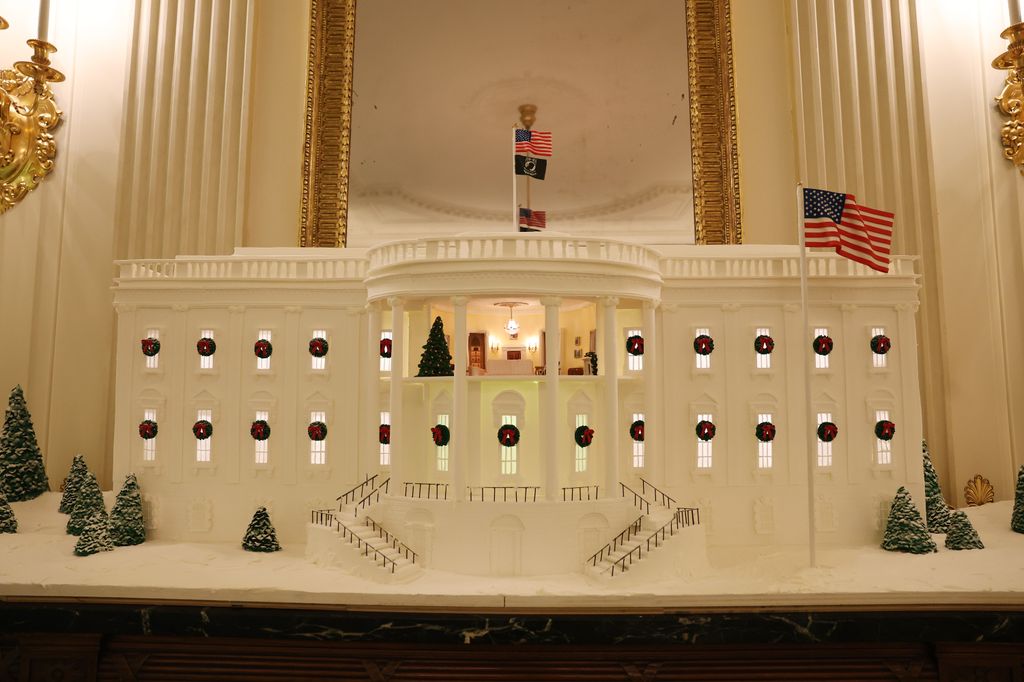 The 2025 Gingerbread House, made of more than 120 pounds of gingerbread, is on display in the State Dining Room