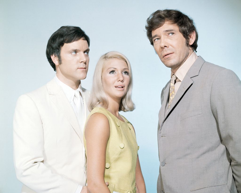 Kenneth Cope (left), as the ghost of Marty Hopkirk, Annette Andre as his wife Jeannie, and Mike Pratt (1931 - 1976) as Jeff Randall, in a promotional portrait for the British TV series 'Randall and Hopkirk (Deceased)', circa 1970. (Photo by Silver Screen Collection/Getty Images)