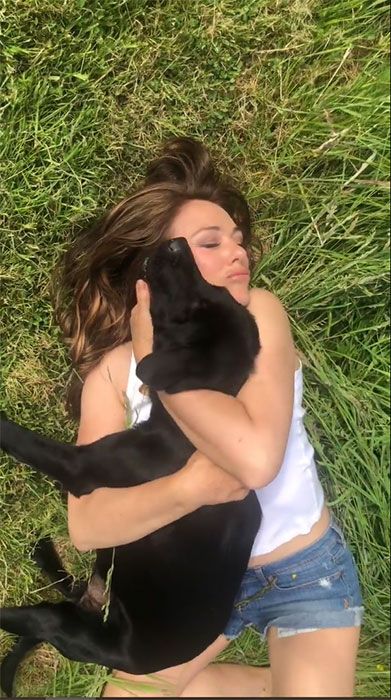 Betsy Trotwood Elke week Rennen Elizabeth Hurley frolics in the grass in tiny denim shorts and fans go wild  | HELLO!