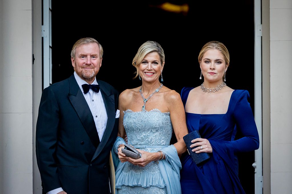 Queen Maxima in blue dress with willem-alexander and amalia