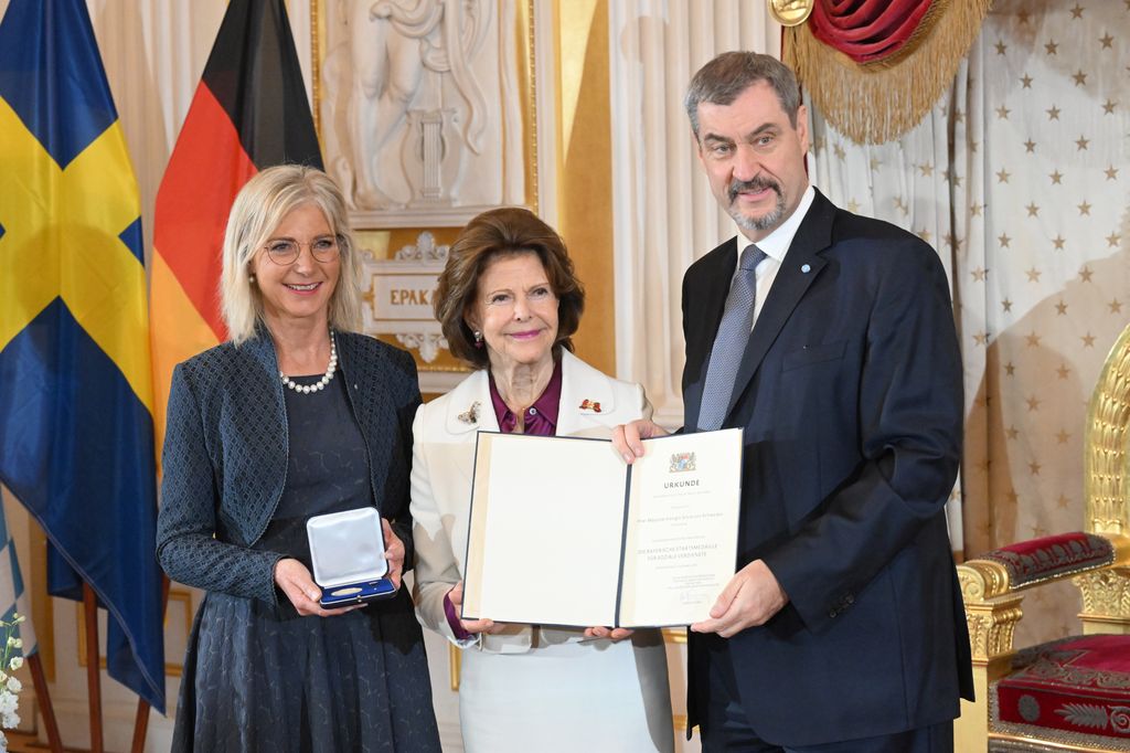 Queen Silvia with her award