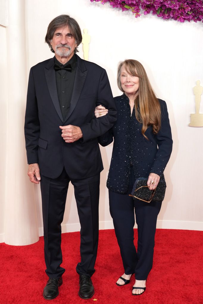 Jack Fisk in black suit and Sissy Spacek in black suit at the 96th Annual Academy Awards