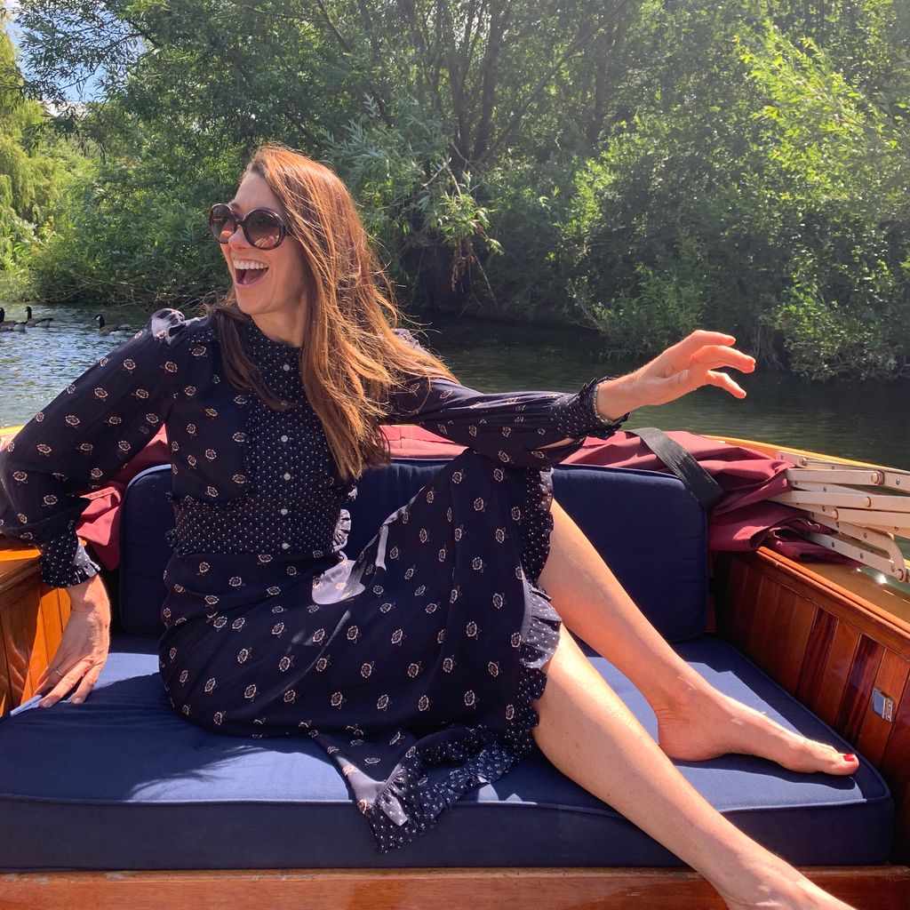 Woman laughing on a boat