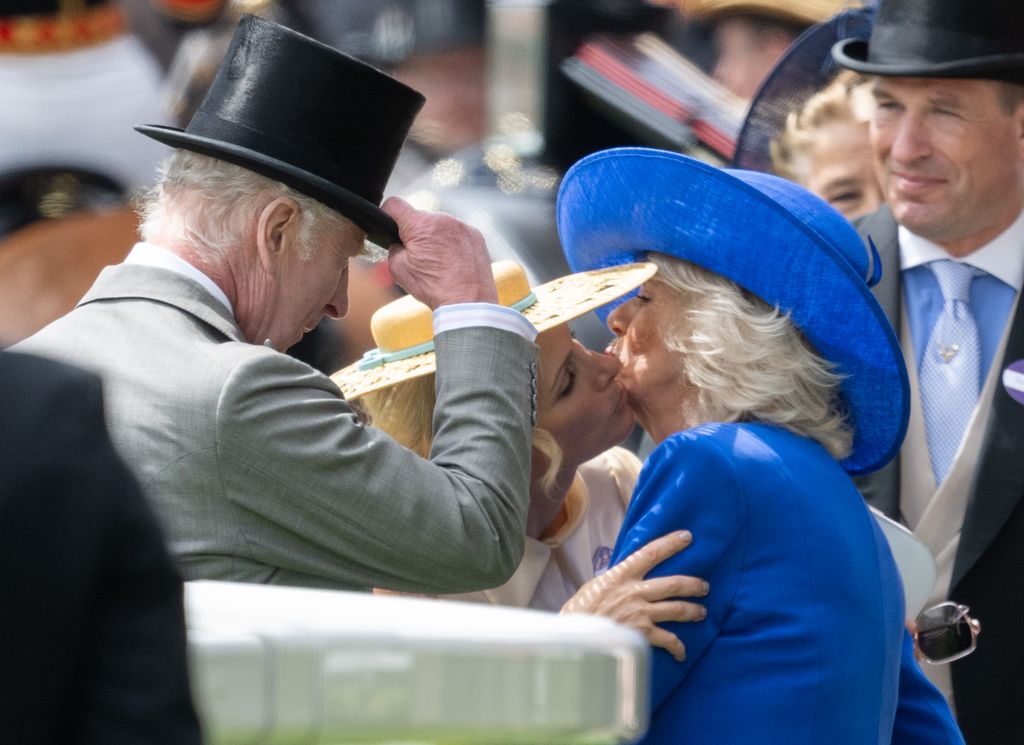 royals sharing a kiss at ascot