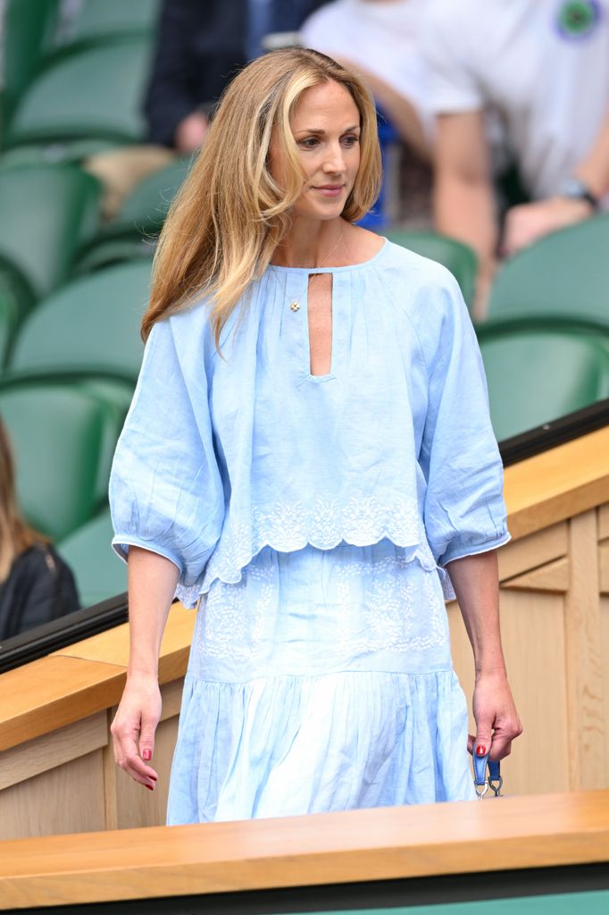 Harriet Sperling in royal box in blue top and skirt