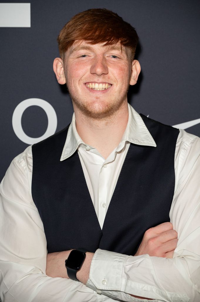 AngryGinge in a black waistcoat and shirt