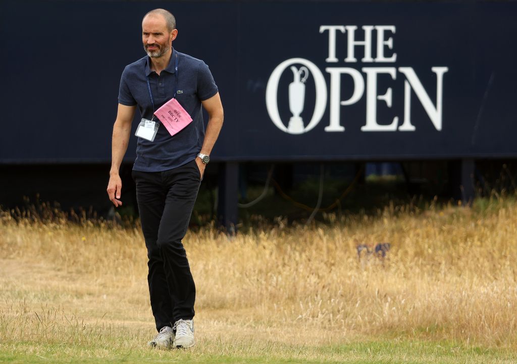 Andrew Cotter walking at the Open