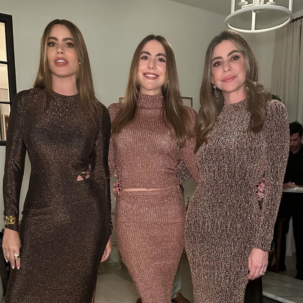Sofia with niece and sister in brown dresses