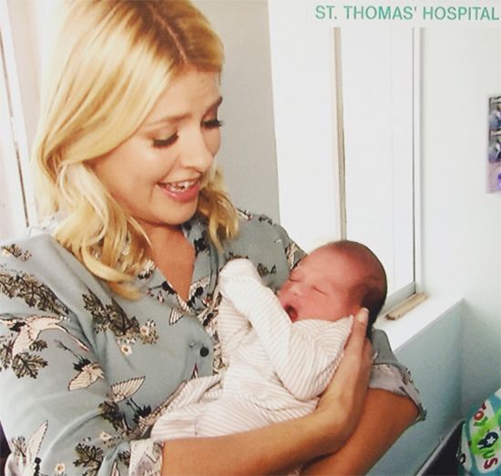 Holly Willoughby cuddles newborn babies during visit to maternity ward on This Morning