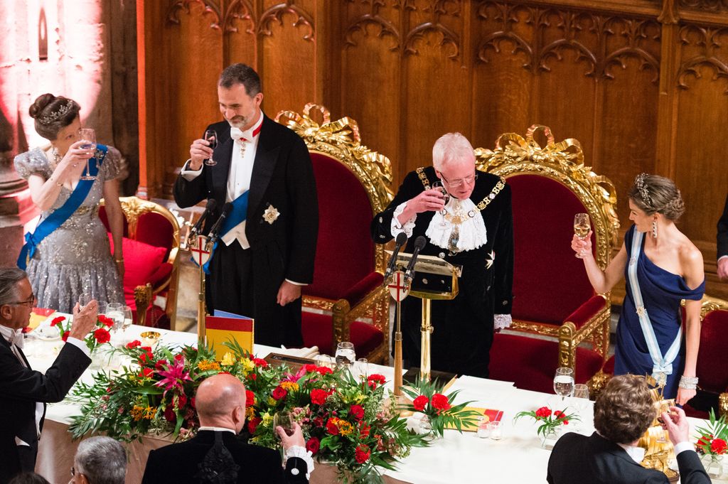 Princess Anne raising a toast with King Felipe and Queen Letizia
