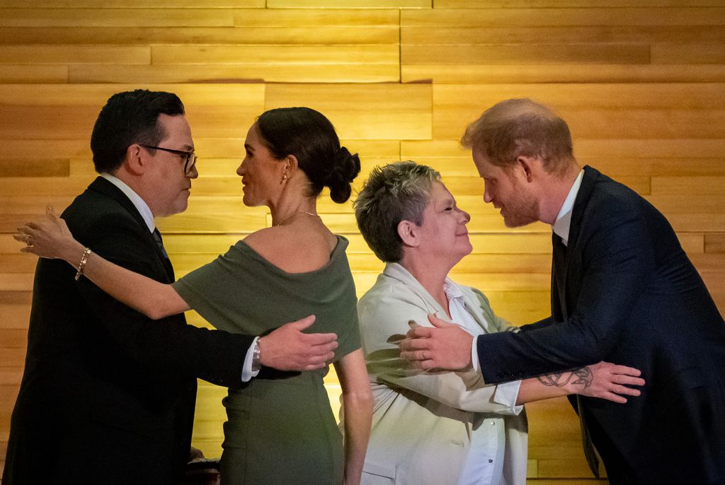 Squamish Nation Councillor, Wilson Williams, from left to right, Meghan, the Duchess of Sussex, Chief of the Tsleil-Waututh Nation, Jen Thomas, and Prince Harry, the Duke of Sussex exchange greetings 