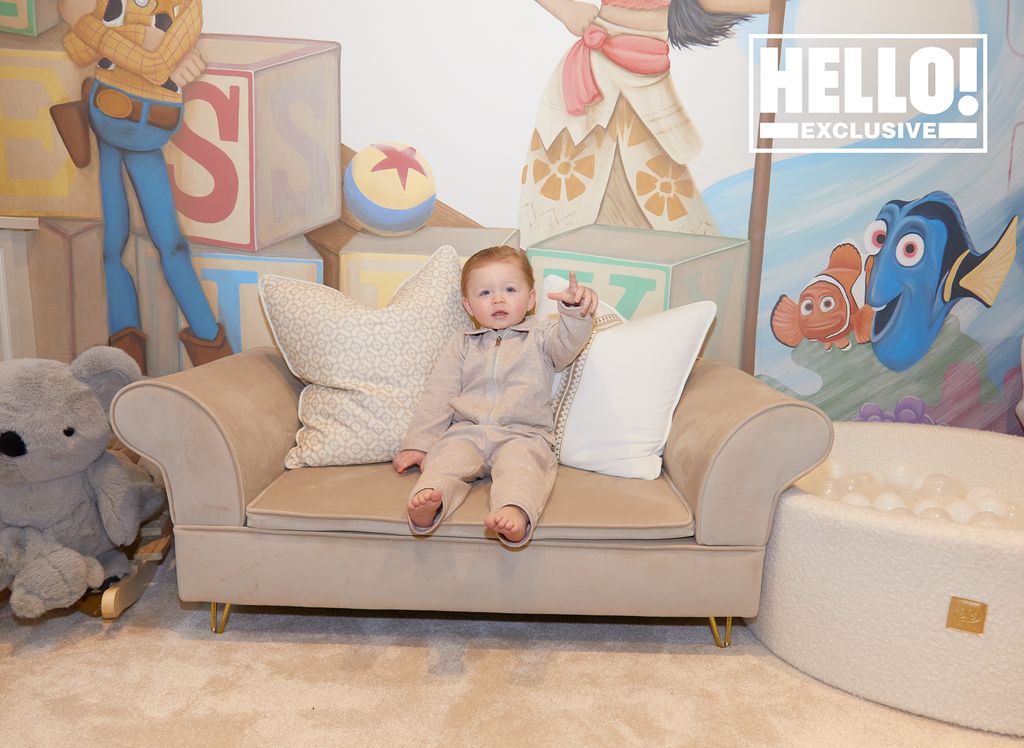 Jessica Wright son Presley in beige tracksuit in Disney themed playroom