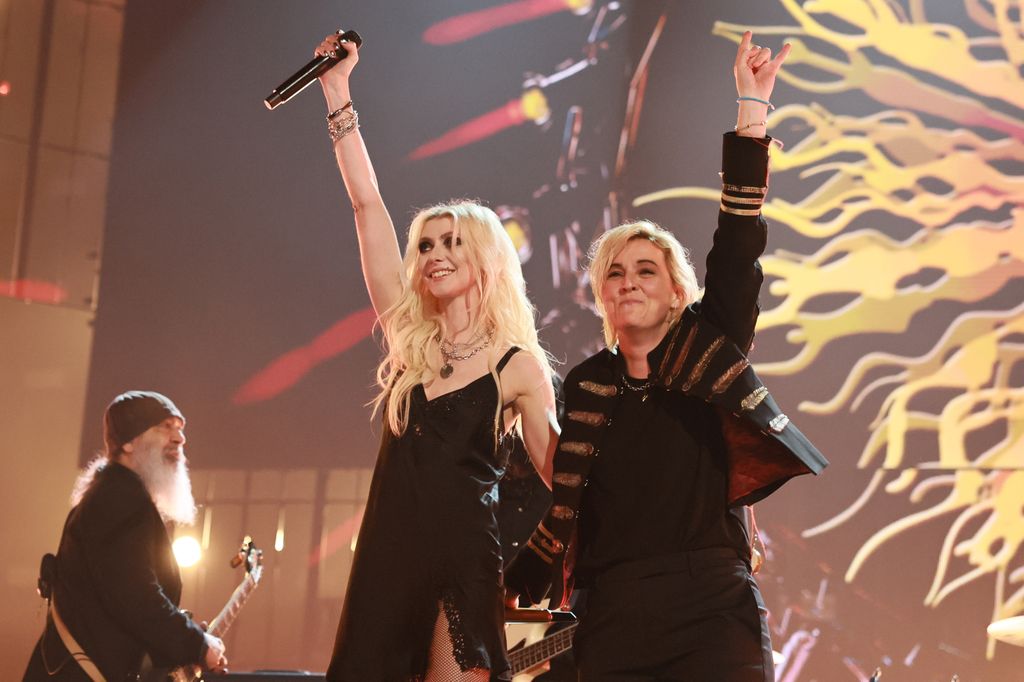 During the ceremony she took the stage with Brandi