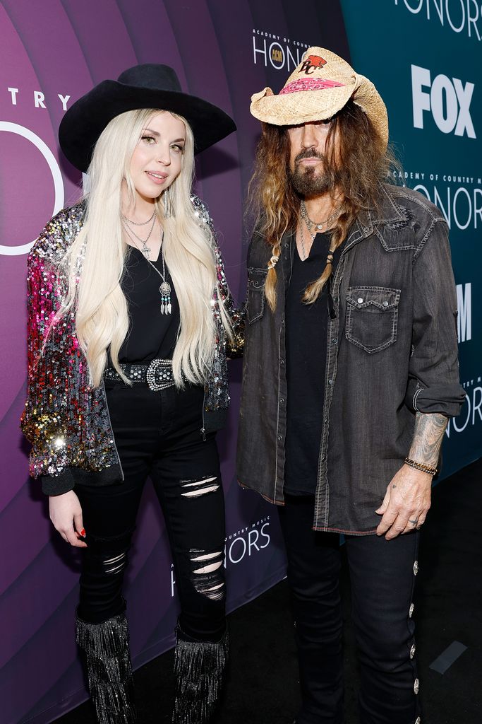 FIREROSE and Billy Ray Cyrus attend the 16th Annual Academy of Country Music Honors at Ryman Auditorium on August 23, 2023 in Nashville, Tennessee.