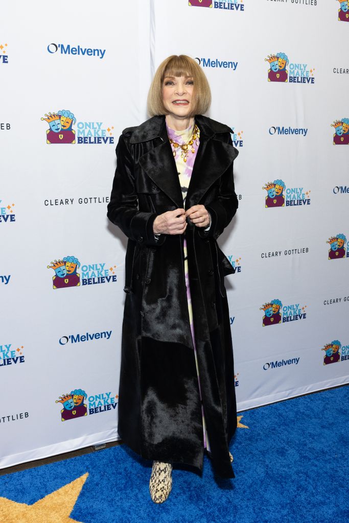 Anna Wintour in black coat and purple dress at the 2025 Only Make Believe Gala 