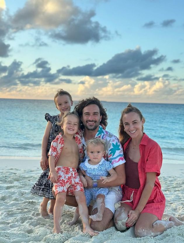 Joe Wicks and his family on the beach