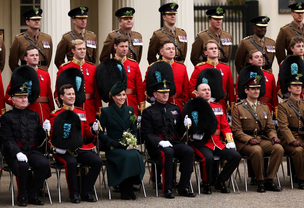 The Princess posed for a family photograph with Officers' and Sergeants' Mess