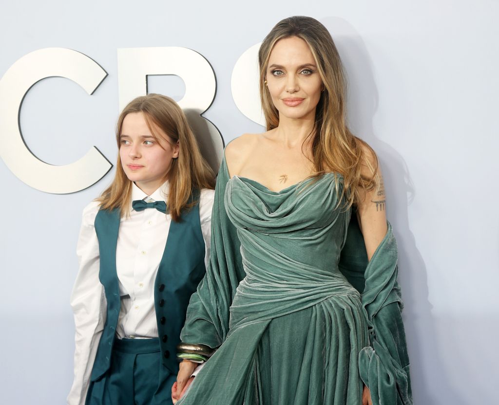 Angelina Jolie and daughter Vivienne posing on the red carpet at The Tony Awards