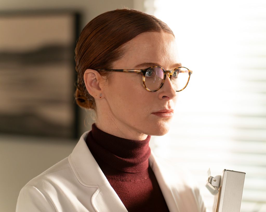 Bridget Regan in still from 9-1-1 as Moira Blake
