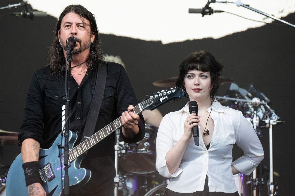 Dave Grohl from the Foo Fighters performs with his daughter Violet Grohl on The Pyramid Stage