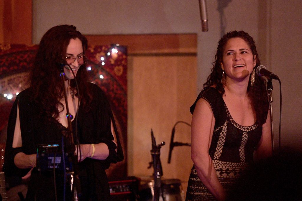 liberty and rain phoenix performing on stage