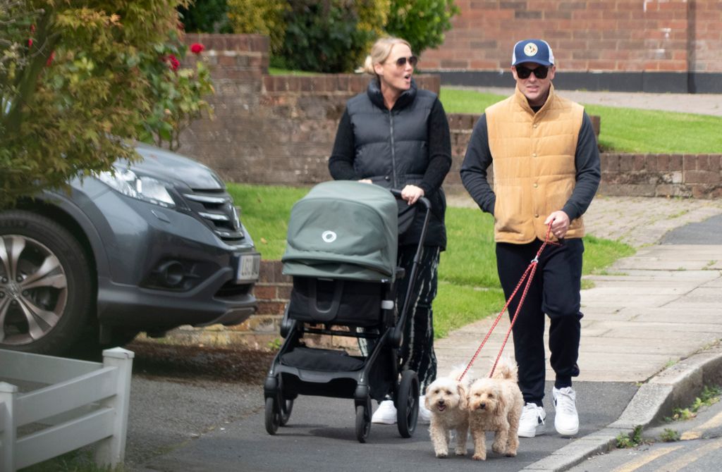 Ant and Anne Marie were pictured pushing a pram on a walk with Wilder and their two dogs