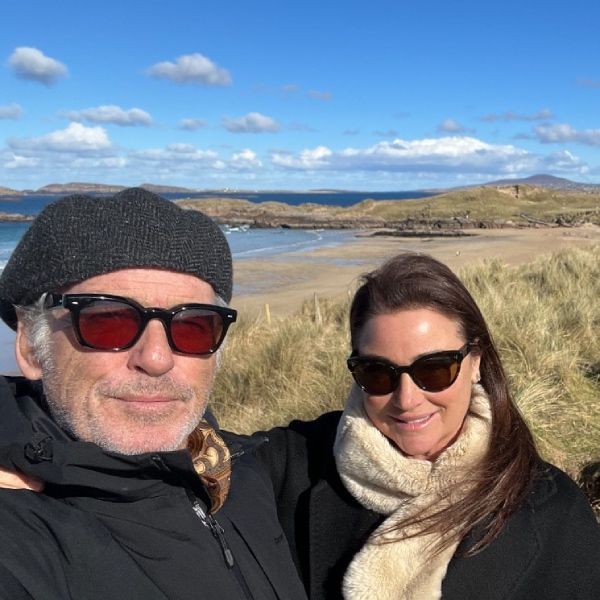 pierce brosnan and wife keely shaye on an irish beach