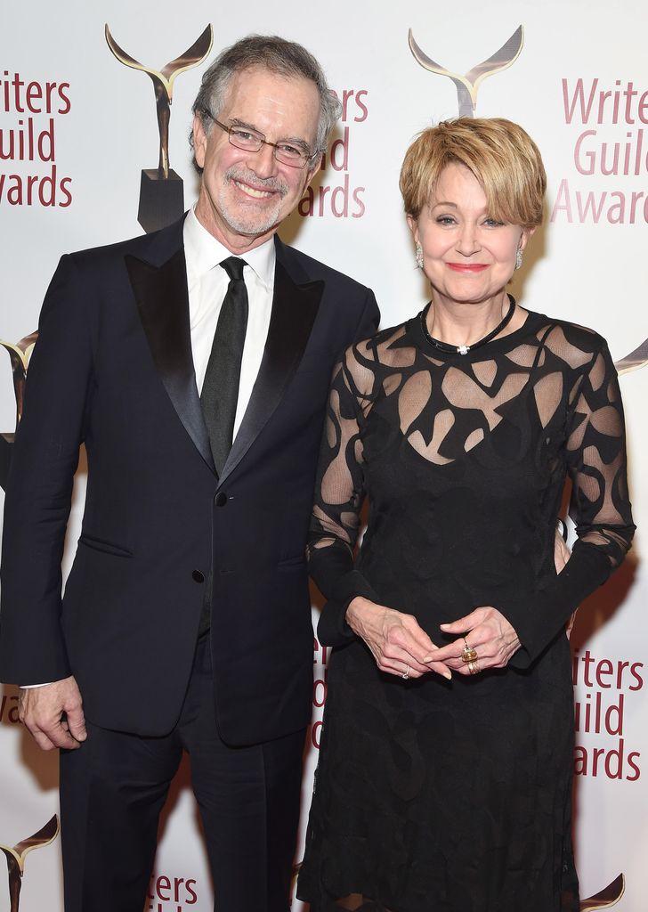 Garry Trudeau in a black suit with Jane Pauley in a black dress