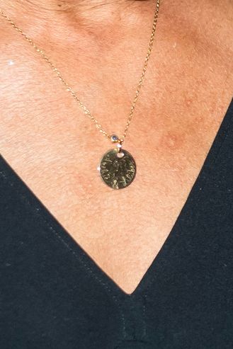 Doria's necklace appeared to be engraved with 'Archie and Lilibet'