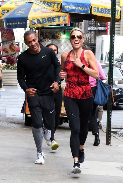 Amy Robach and TJ Holmes running