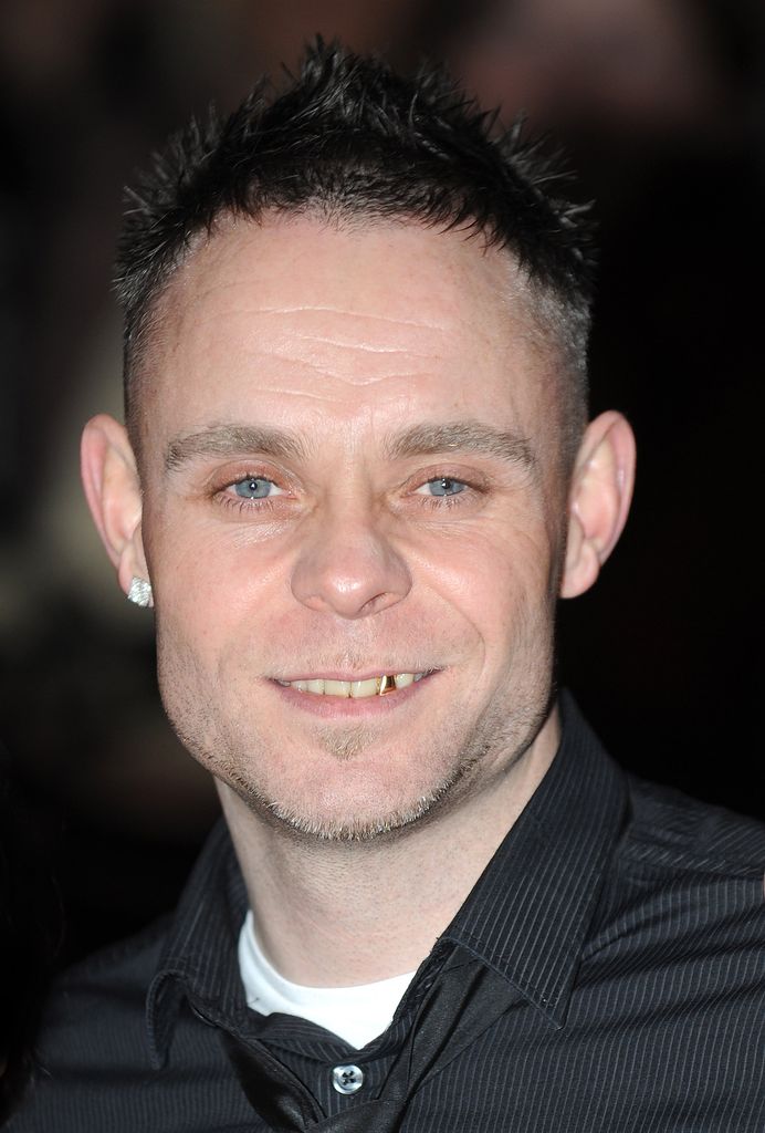 Brian Harvey in a black suit