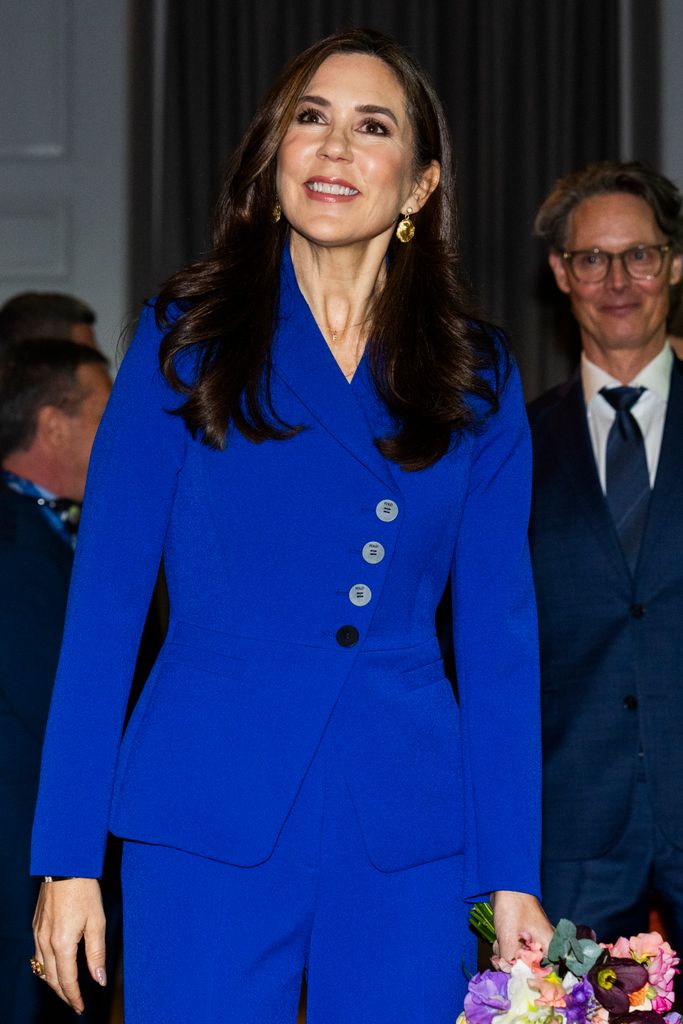 Queen Mary wearing cobalt blue suit