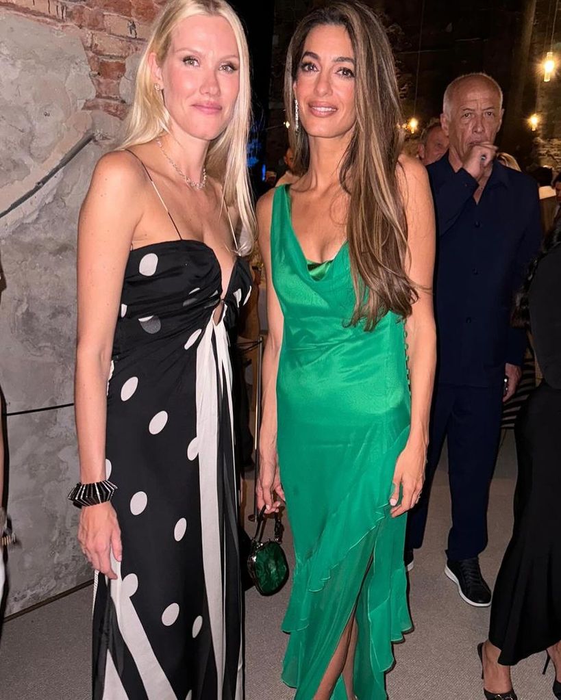 Amal was photographed with Raquel Diniz wearing the same dress she wore in 2023